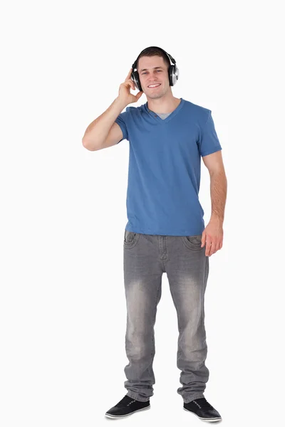 Portrét smějící se muž se sluchátky — Stock fotografie