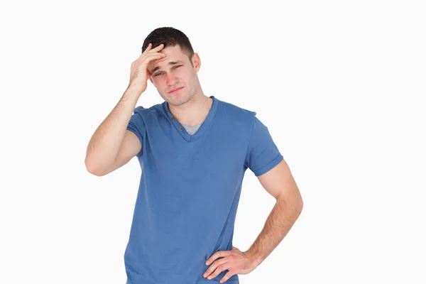 Genç adam bir baş ağrısı olması — Stok fotoğraf