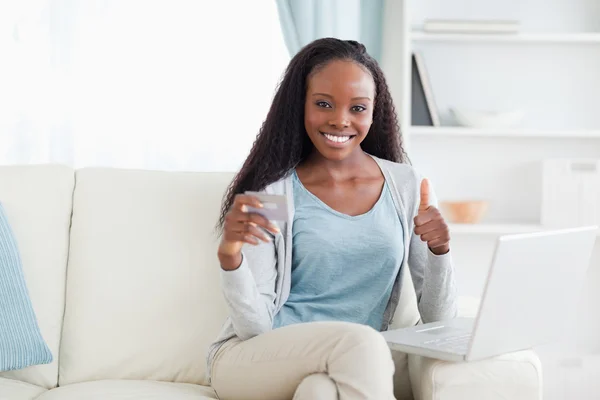 Woman happy about online shopping — Stock Photo, Image