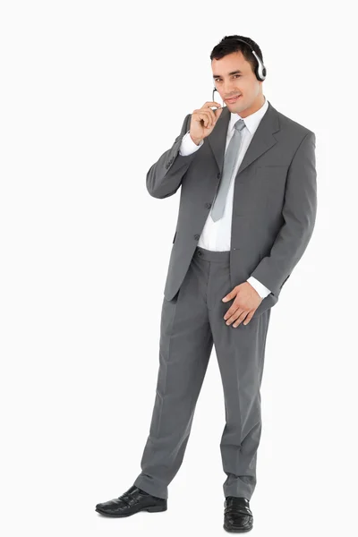 Uomo d'affari che parla con le cuffie — Foto Stock