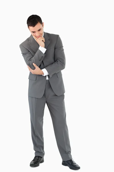 Businessman looking on the floor while thinking — Stock Photo, Image