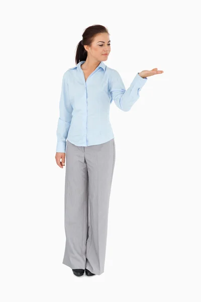 Businesswoman looking at what she is presenting — Stock Photo, Image