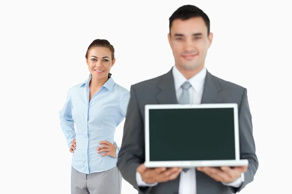 Business partner presenting laptop — Stock Photo, Image