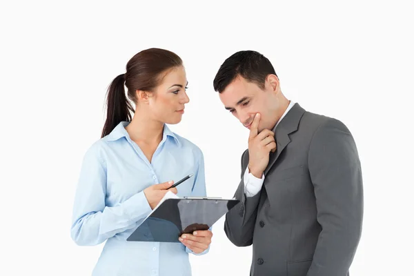 Business partners talking about data — Stock Photo, Image