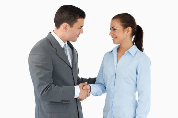 Young business partners closing a deal — Stock Photo, Image