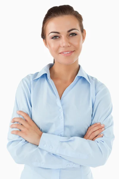 Smiling businesswoman with arms folded — Stock Photo, Image