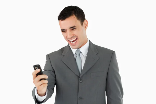 Affärsman glad över SMS — Stockfoto
