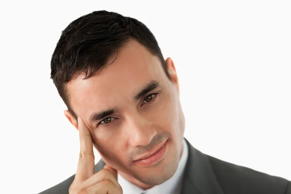 Close up of young businessman in thoughts — Stock Photo, Image