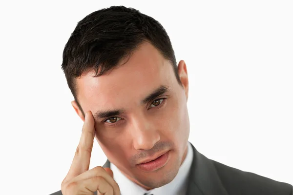 Close up of young businessman lost in thoughts — Stock Photo, Image