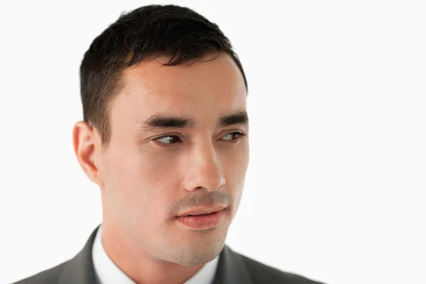 Close up of businessman looking to his left — Stock Photo, Image