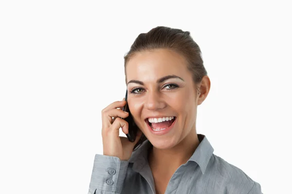 Primer plano de la mujer de negocios riendo en el teléfono —  Fotos de Stock