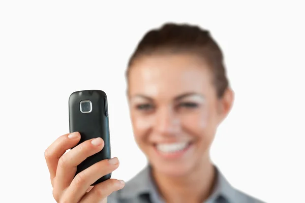 Close up of text message being read by businesswoman — Stock Photo, Image