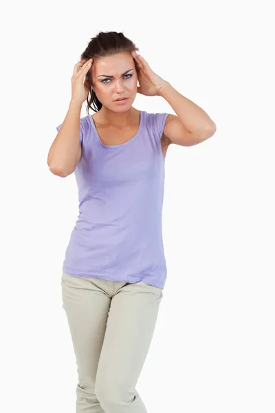 Young female experiencing a headache — Stock Photo, Image