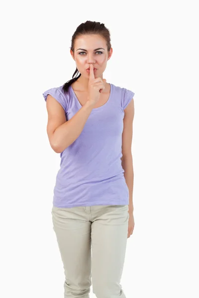 Young female asking for silence — Stock Photo, Image