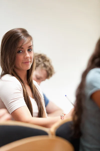 Portrait of a distracted student sitting — Stock Photo, Image