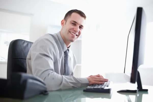 Businessman working with his computer Stock Image