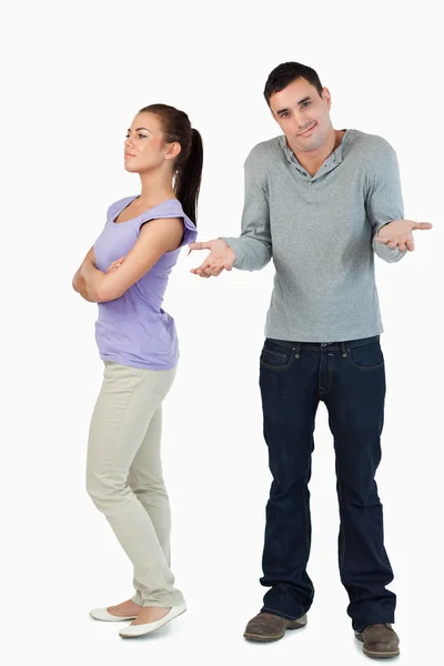 Young male has no clue why his girlfriend is upset Stock Picture