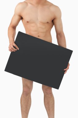 Atletic male body holding banner in his hands clipart