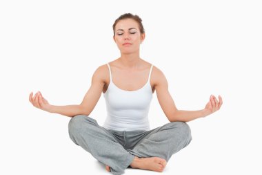 Woman in the Sukhasana position clipart