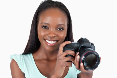 Smiling young photographer clipart