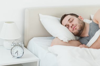 Attractive man sleeping clipart