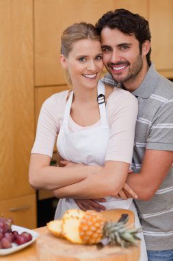 Portrait of a posing with fruits clipart