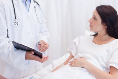 Female patient getting examination results explained clipart