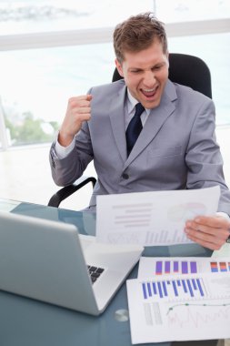 Businessman loves the result of market research clipart