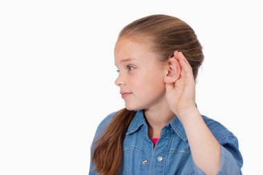 Cute girl pricking up her ear clipart