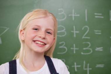 Blonde schoolgirl posing clipart