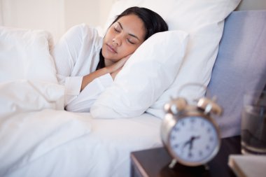 Side view of sleeping woman clipart