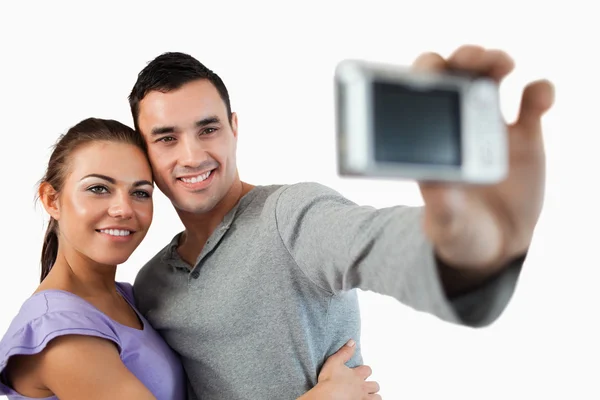 Ungt par ta foto av sig själva — Stockfoto