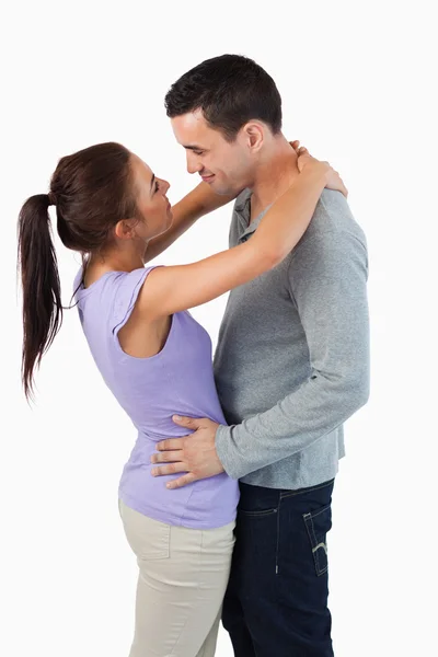 Young couple embracing — Stock Photo, Image
