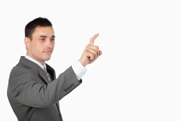 Biznesmen za pomocą niewidocznych ekran dotykowy — Zdjęcie stockowe