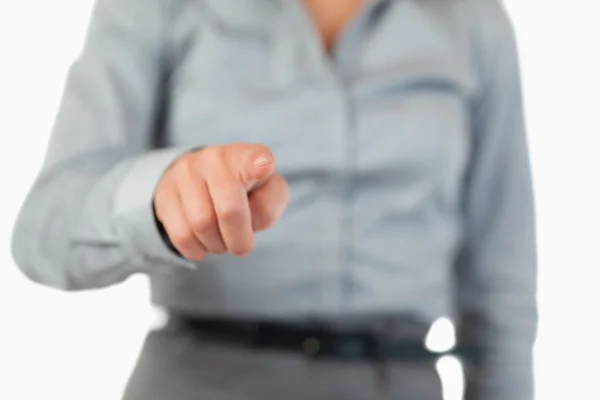 Close up of a businesswoman pressing an invisible key — Stock Photo, Image