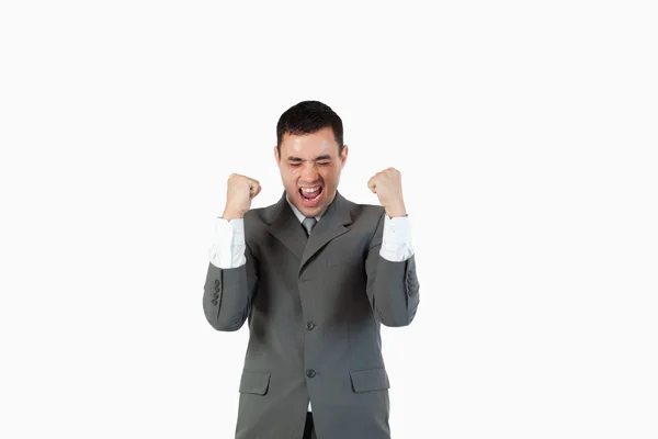 Succesvolle zakenman met de vuisten omhoog — Stockfoto