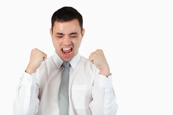Young businessman with the fists up — Stock Photo, Image