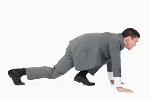 Side view of a businessman ready of a race — Stock Photo, Image