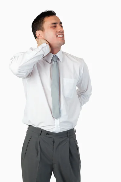Portrait of a businessman having a back pain — Stockfoto