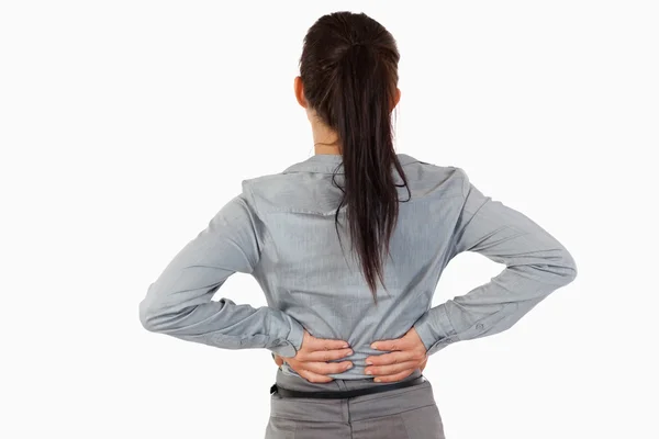 Painful back of a businesswoman — Stock Photo, Image