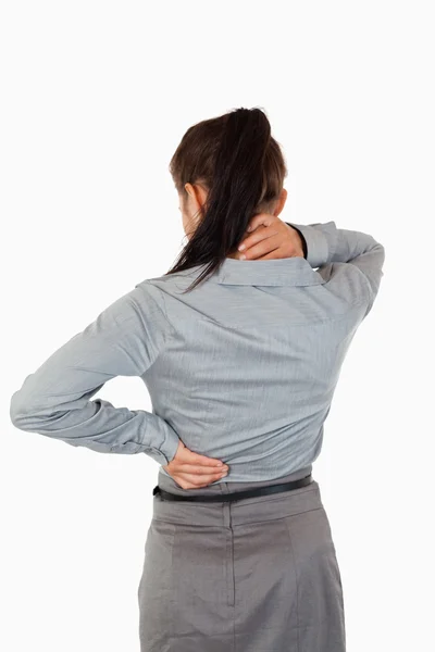 Ritratto della schiena dolorosa di una donna d'affari — Foto Stock
