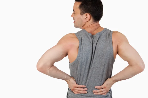 Людина болить спину — стокове фото