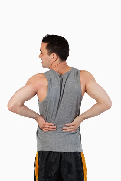 Porträt eines Mannes mit Rückenschmerzen — Stockfoto