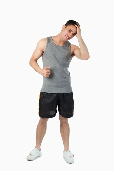 Jovem do sexo masculino em panos esportivos leves — Fotografia de Stock
