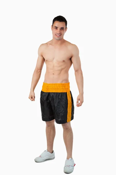 Desportivo jovem do sexo masculino em boxer shorts — Fotografia de Stock
