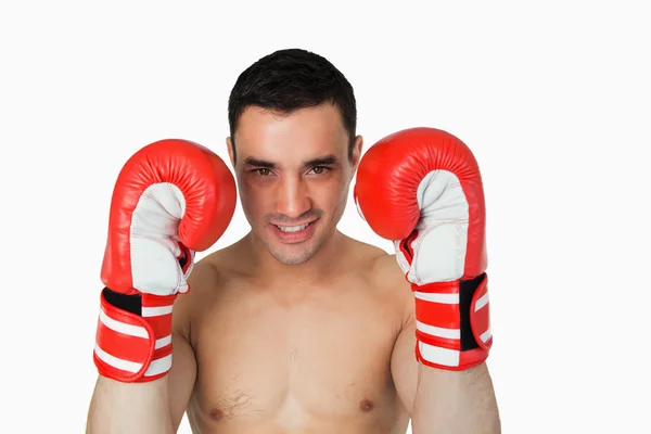 Smiling boxer taking cover — Stock Photo, Image