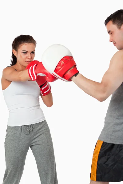 Young female boxer focused on her target — Stock Photo, Image