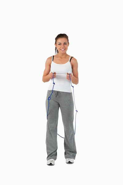 Young female about to start jump roping — Stock Photo, Image