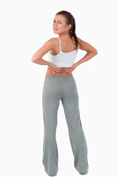 Rückenansicht einer Frau mit Rückenschmerzen — Stockfoto