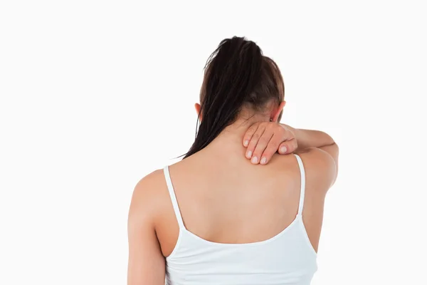 Widok kobiety z ból w szyi z tyłu — Zdjęcie stockowe